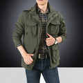 Men's multifunctional utility field jacket with numerous flap and zipped pockets as well as D-rwg