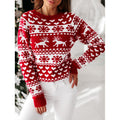 Woman in a reindeer jacquard sweater