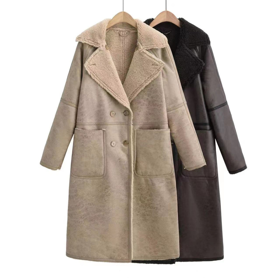Woman in a belted faux shearling coat