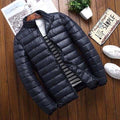 Quilted Men's jacket with stand-up collar, o light construction - for transitional weather