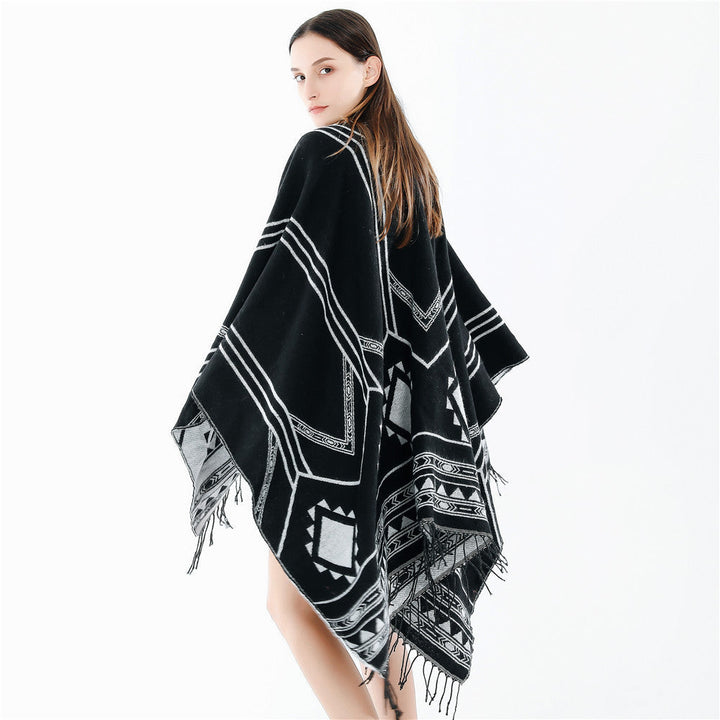 Unisex Ethno-Poncho made of soft knit with fringes and geometric pattern
