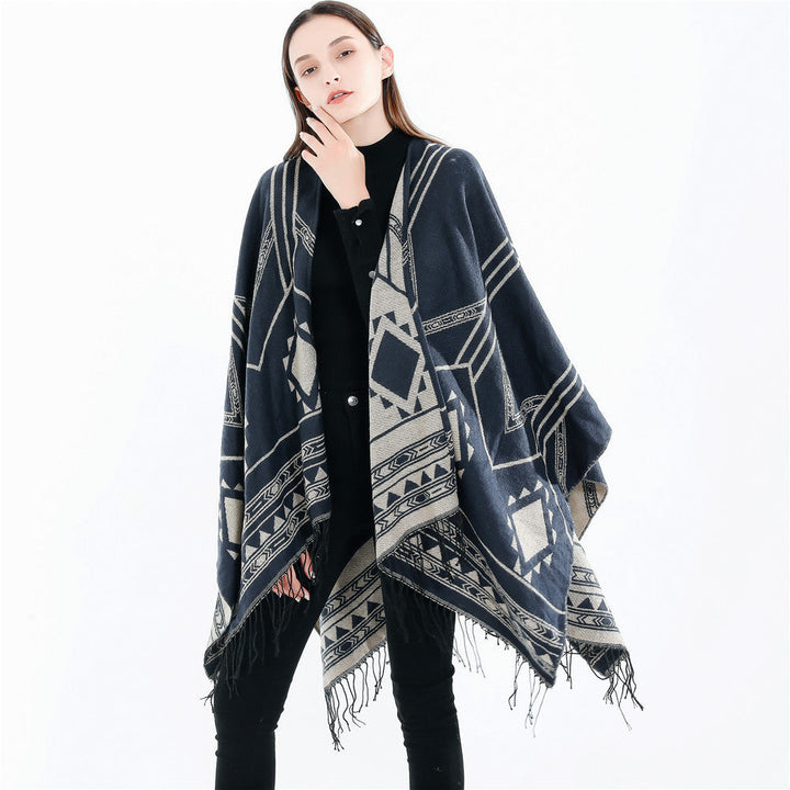 Unisex Ethno-Poncho made of soft knit with fringes and geometric pattern