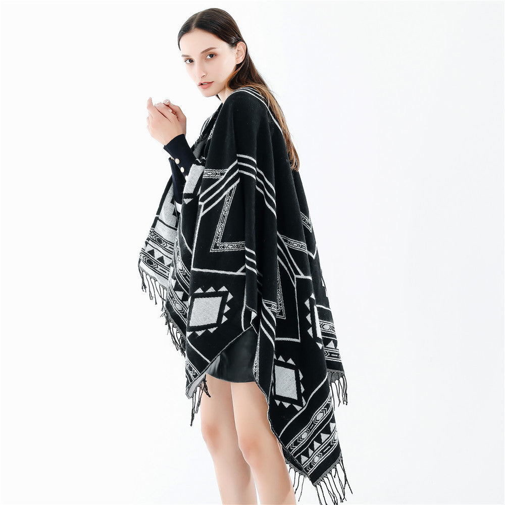 Unisex Ethno-Poncho made of soft knit with fringes and geometric pattern