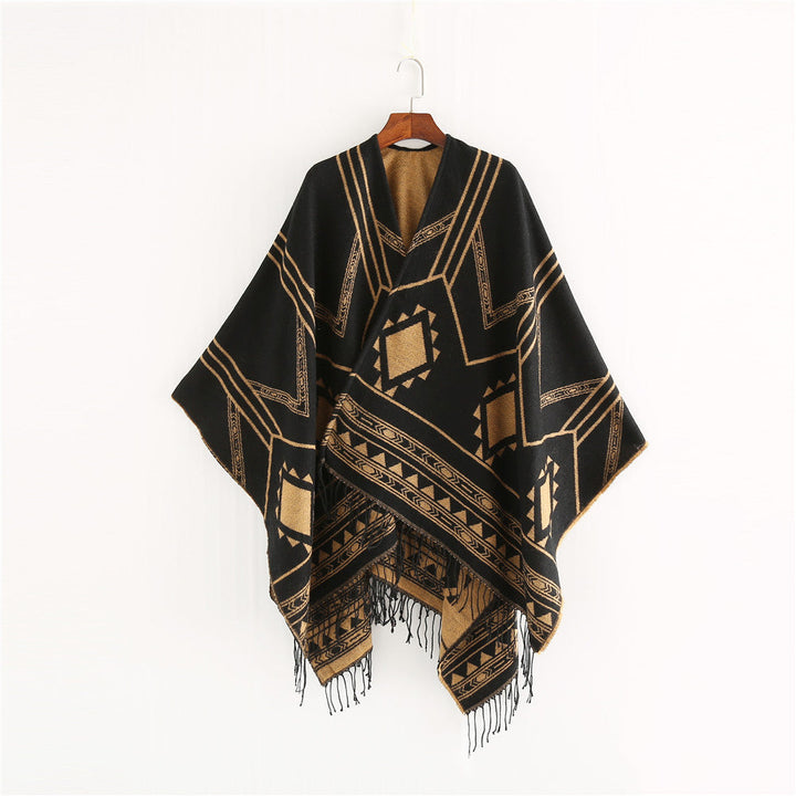 Unisex Ethno-Poncho made of soft knit with fringes and geometric pattern