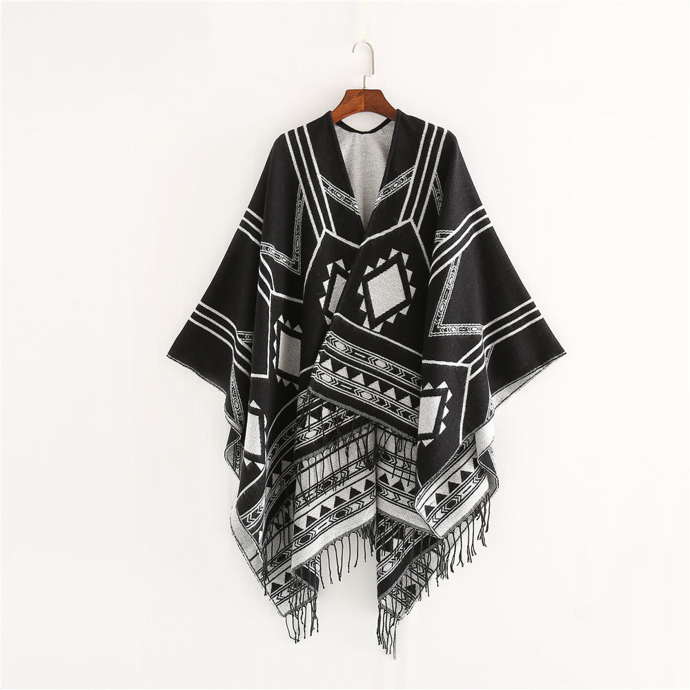 Unisex Ethno-Poncho made of soft knit with fringes and geometric pattern