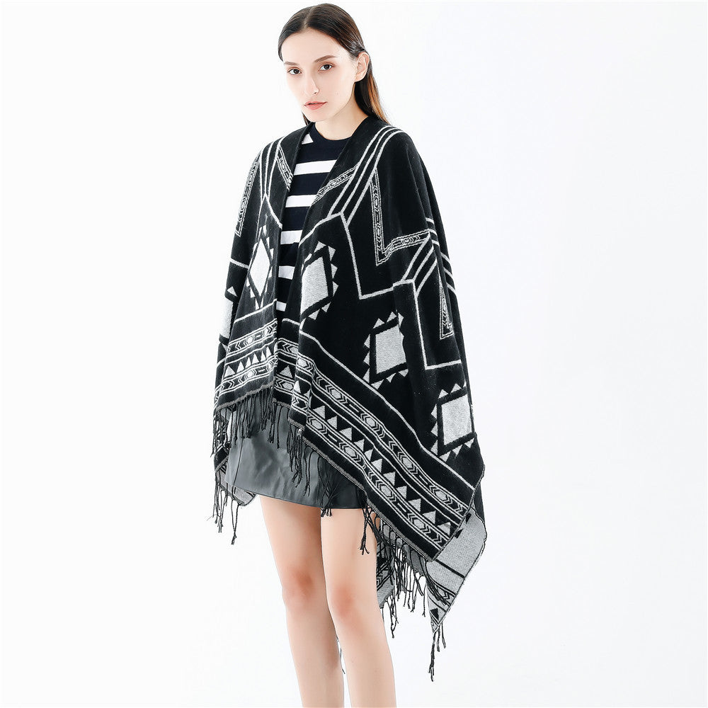 Unisex Ethno-Poncho made of soft knit with fringes and geometric pattern