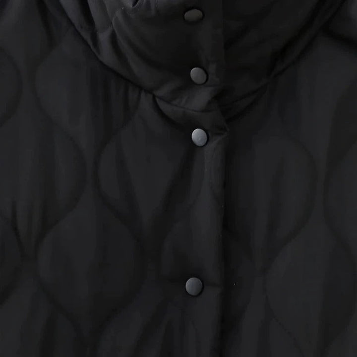 Women’s quilted jacket with stand-up collar and contrasting ruffled pockets