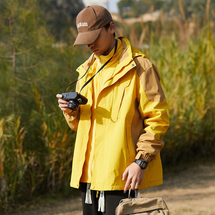 Women two-layer water-repellent outdoor jacket with hood, waist adjustment and contrast piping