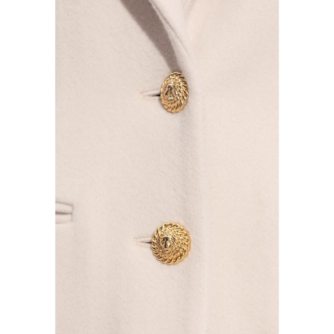 Women’s long-cut wool coat with tailored fit and golden buttons