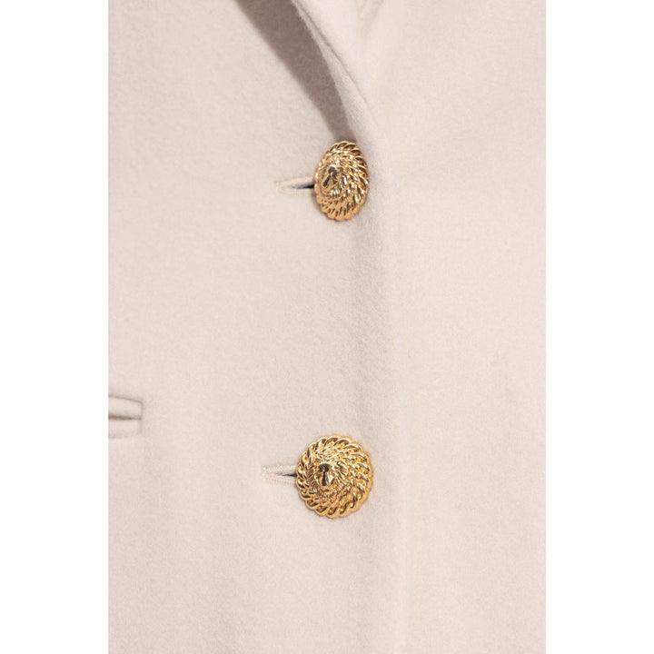 Women’s long-cut wool coat with tailored fit and golden buttons