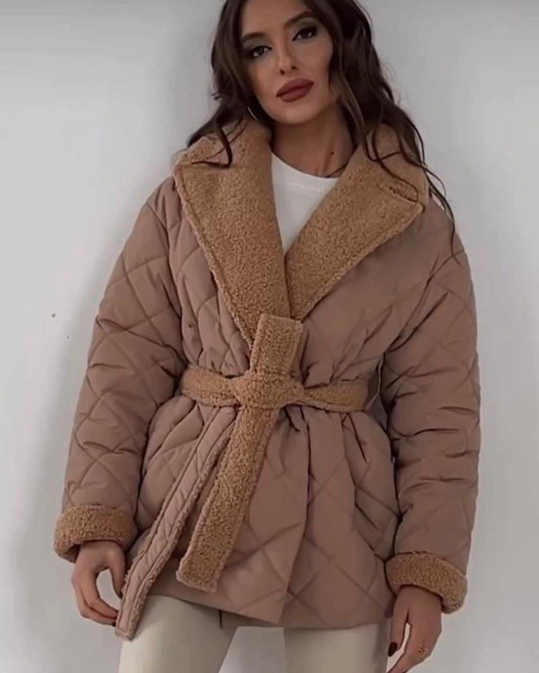 Women’s quilted jacket with teddy lining, fitted belt and large shawl collar