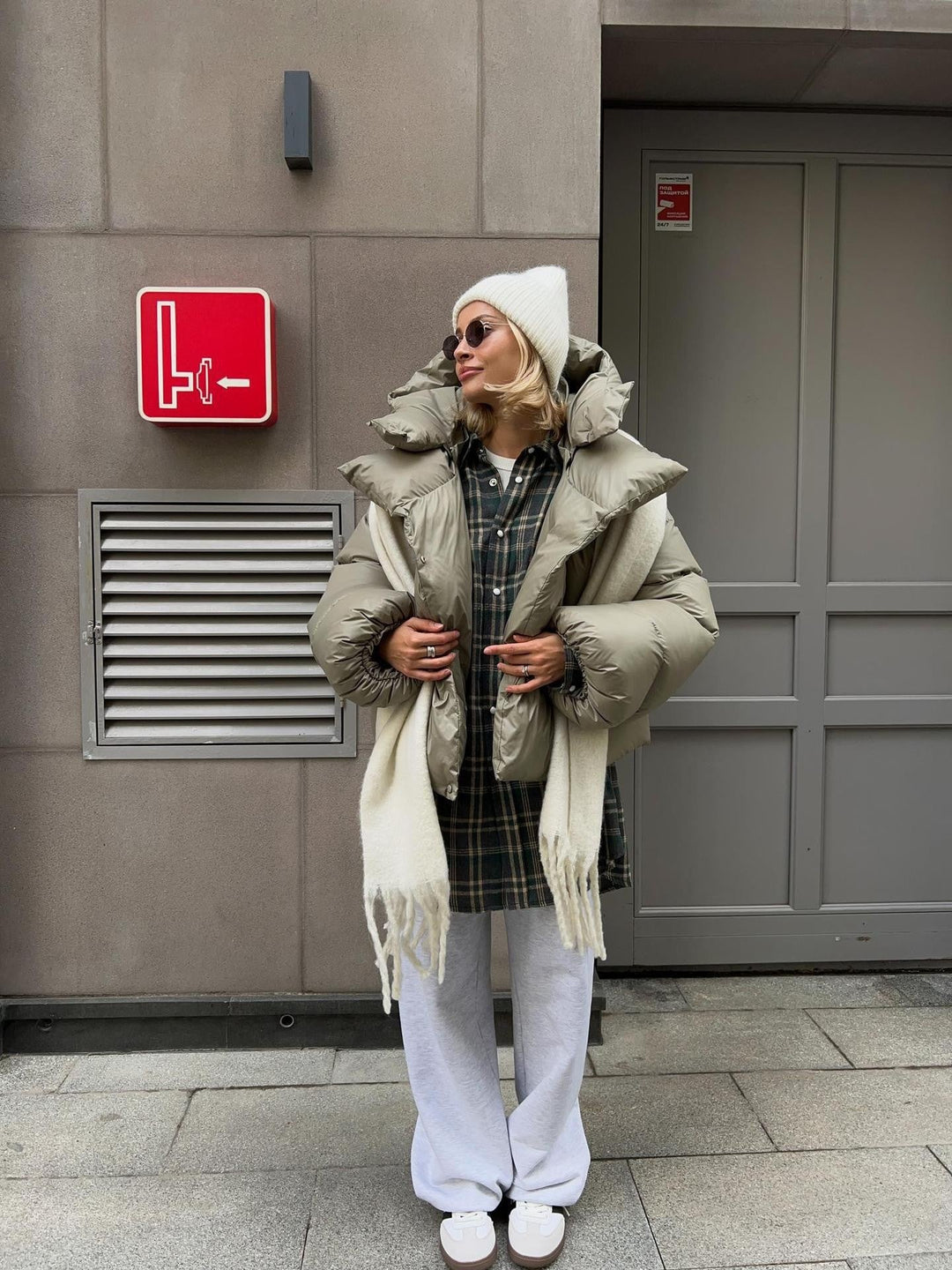 Women extravagant oversized quilted down jacket with extra voluminous hood