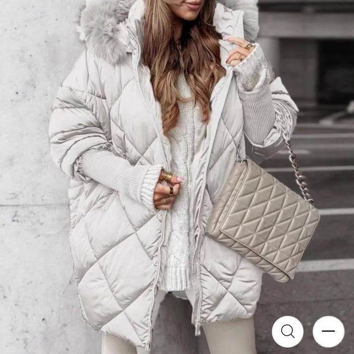 Women longer quilted winter parka with large hood and faux fur trim