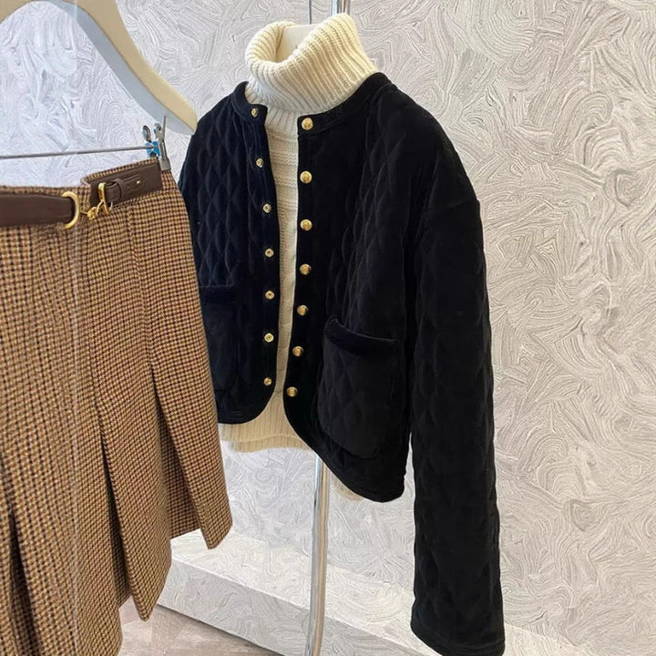 Ladies short cut quilted velvet cardigan with golden medallion buttons