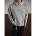 Men's streetwear hoodie with studs and contrast drawstrings