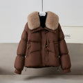 Ladies' short quilted jacket with voluminous faux fur collar, toggle closure, and shape-stable waistline