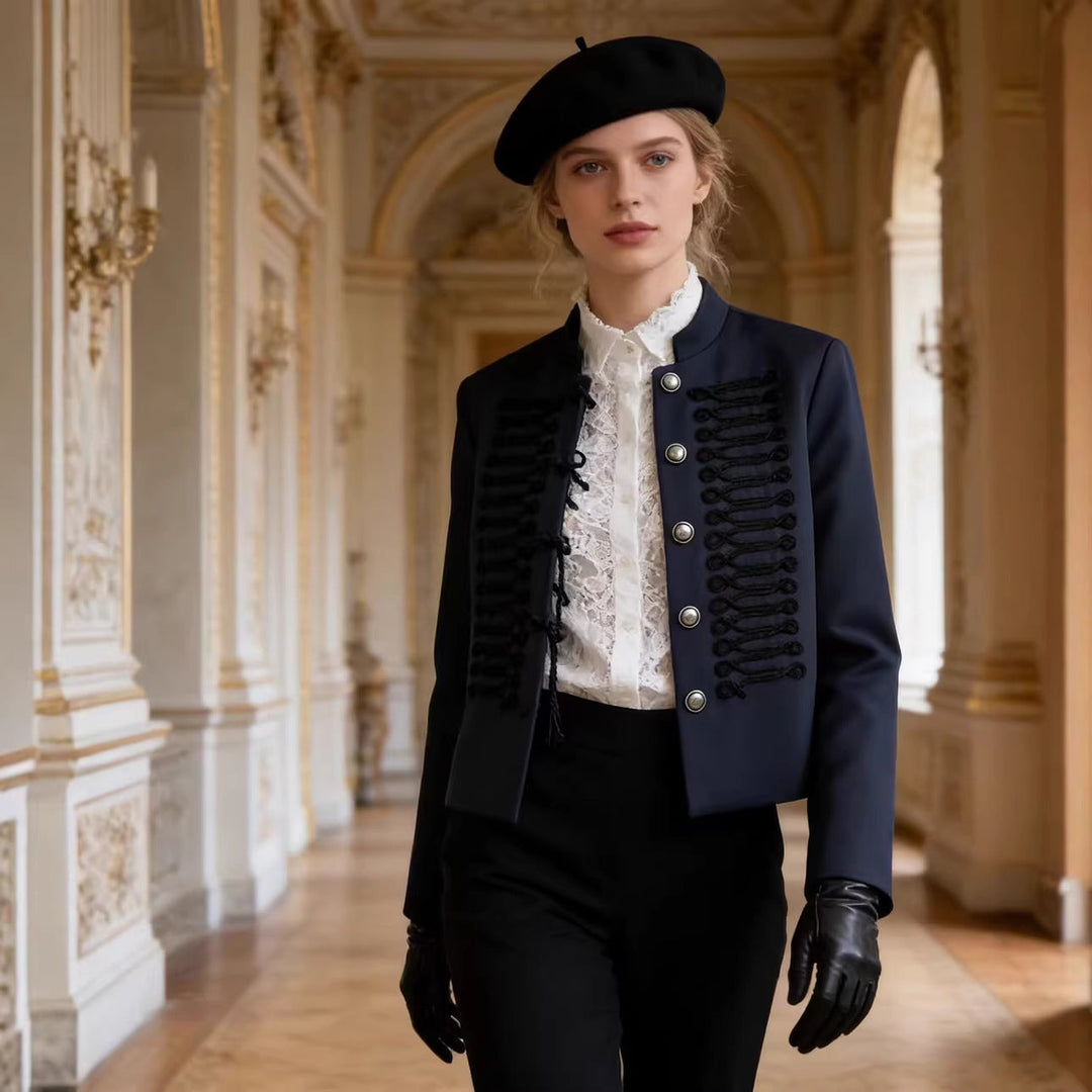Women’s short military-style jacket with stand-up collar, decorative cord trimming, and decorative buttons