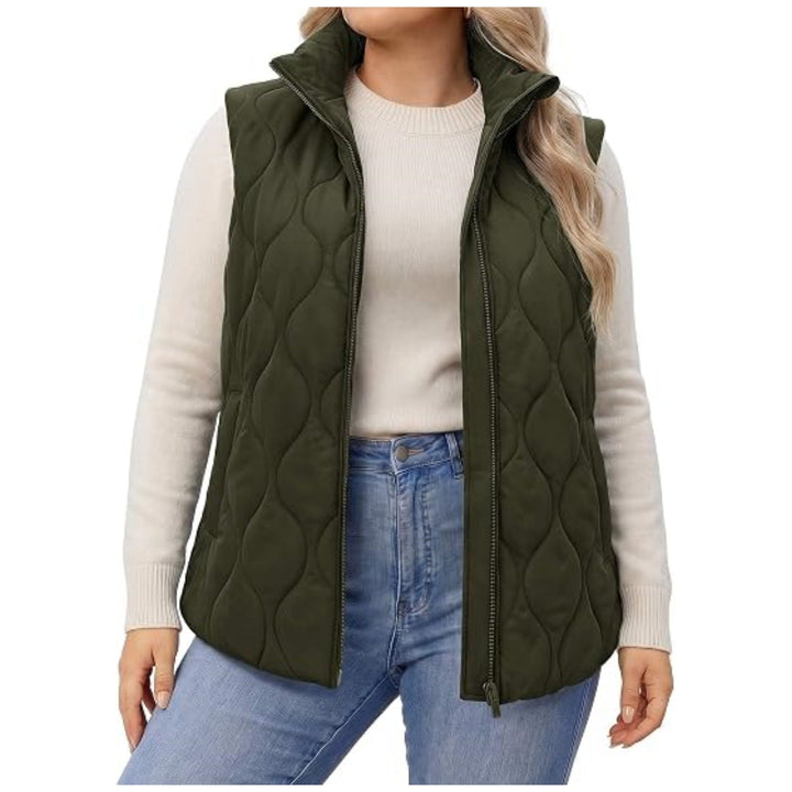 Ladies quilted vest with high collar, figure-flattering silhouette and side pockets