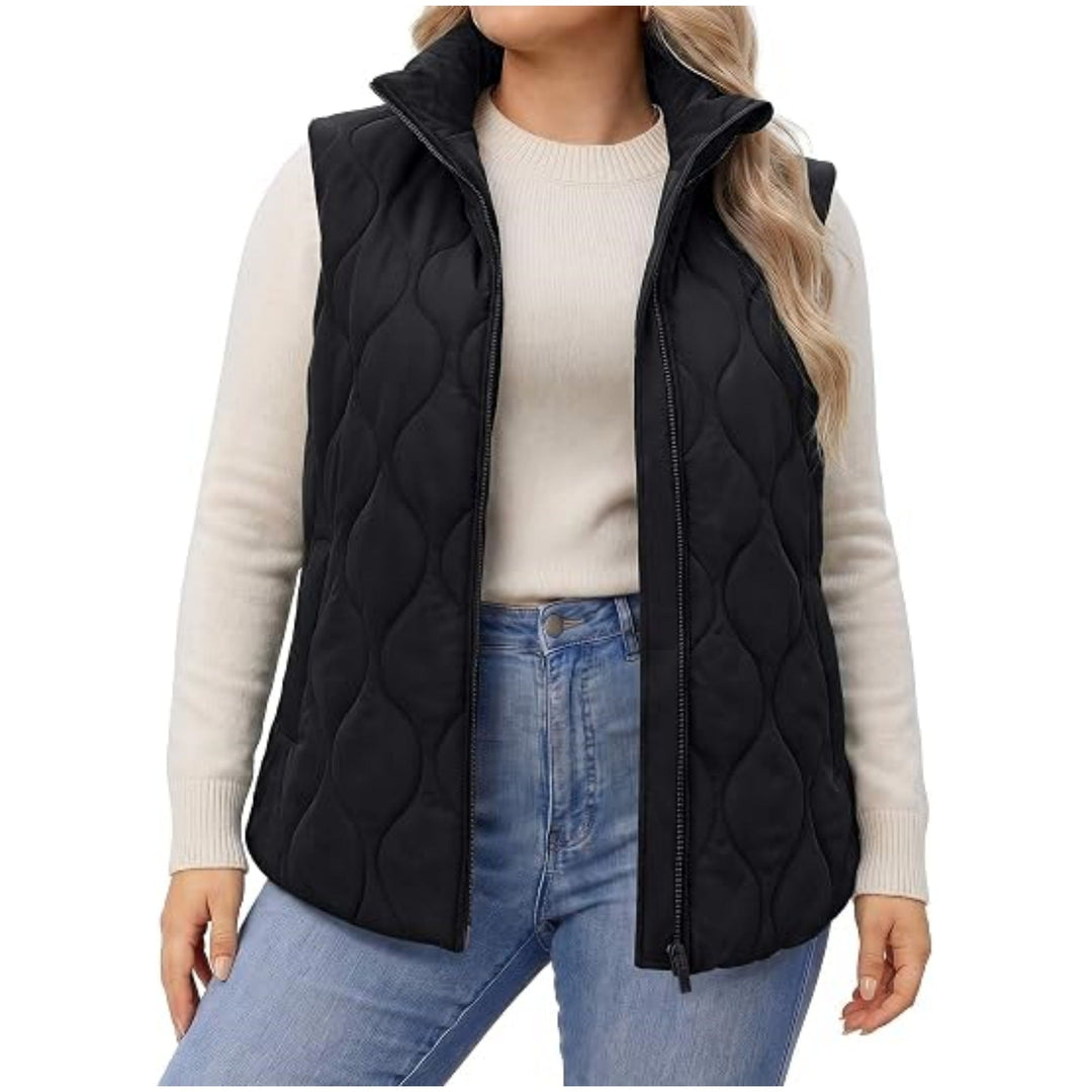 Ladies quilted vest with high collar, figure-flattering silhouette and side pockets