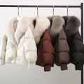 Women's short padded jacket with luxurious faux fur collar and tailored drawstring