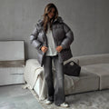 Women's quilted jacket with waist drawstring and hood