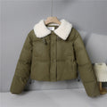 Women's quilted winter jacket with teddy collar, padded insulation, and concealed snap button closure