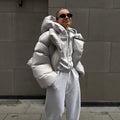 Women extravagant oversized quilted down jacket with extra voluminous hood