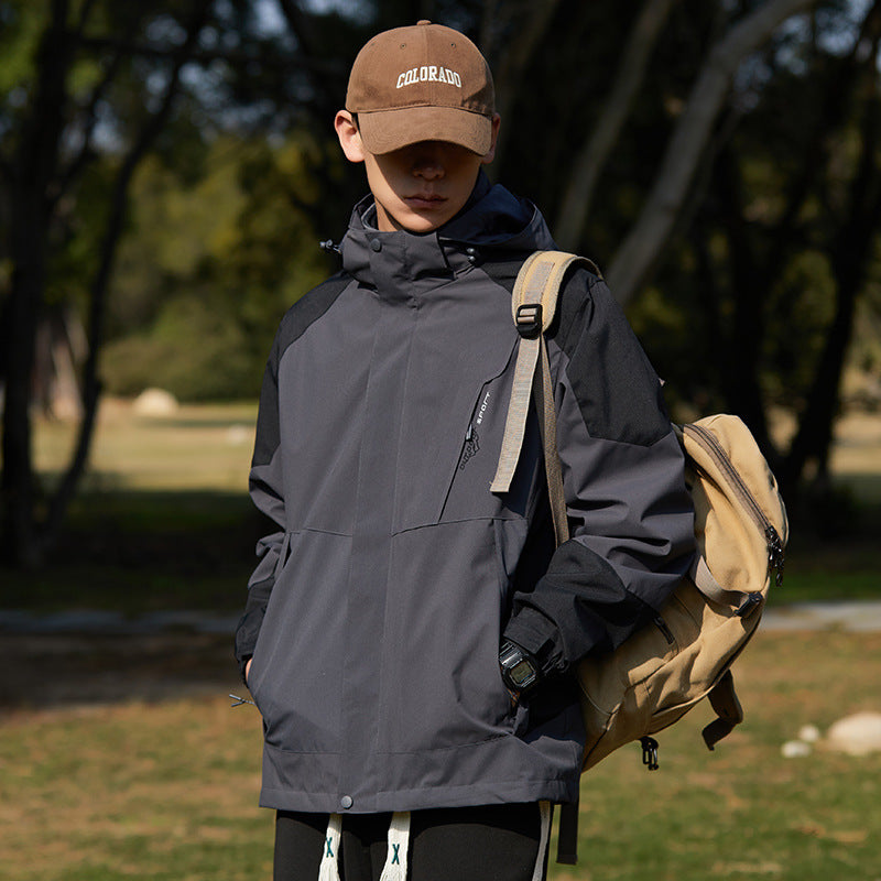 Women two-layer water-repellent outdoor jacket with hood, waist adjustment and contrast piping
