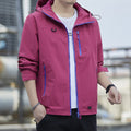 Men's lightweight Urban softshell hoodie jacket with contrasting zips, chest pocket, and adjustable drawstring hem