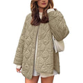 Women's padded oversized quilted jacket with snap button placket and rounded hem
