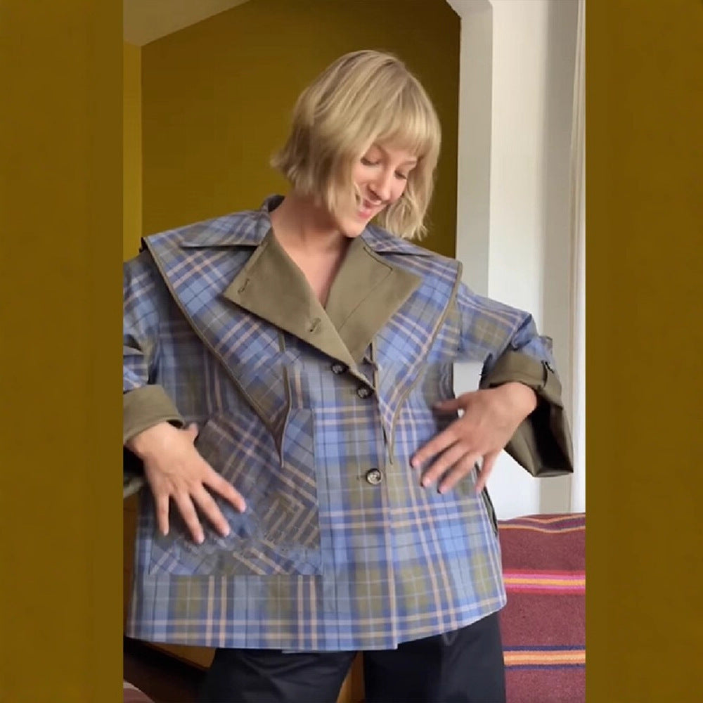 Women’s short jacket with check collar, tie scarf, and monogram pocket