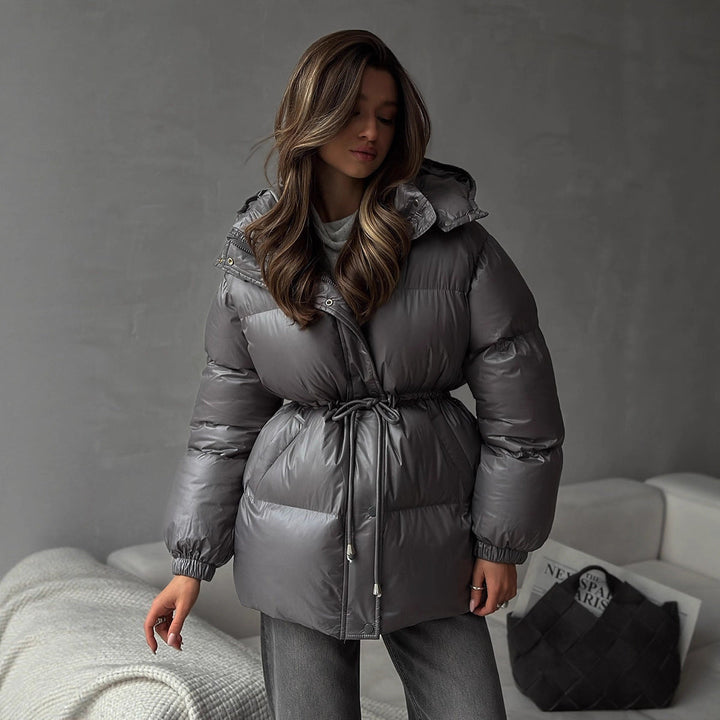 Women Longer padded parka with hood, drawstring waist and oversized silhouette