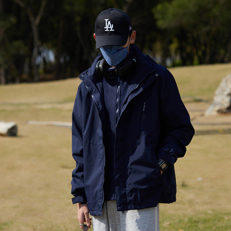 Women two-layer water-repellent outdoor jacket with hood, waist adjustment and contrast piping