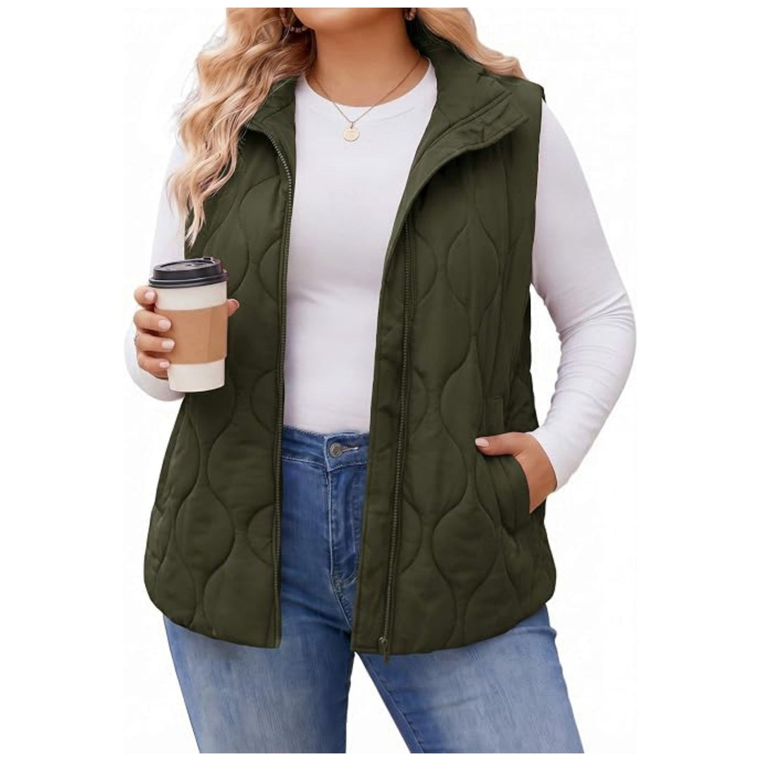 Ladies quilted vest with high collar, figure-flattering silhouette and side pockets