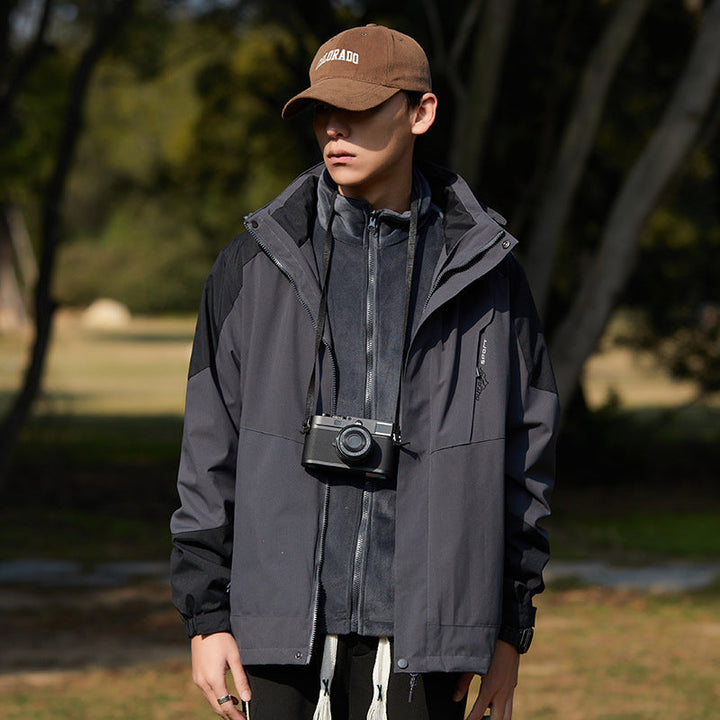Women two-layer water-repellent outdoor jacket with hood, waist adjustment and contrast piping