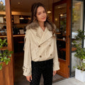 Women's double-breasted blouson with removable faux fur collar, waist drawstring and adjustable cuffs