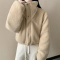 Women's short padded jacket with high-closing shawl collar and teddy cuffs