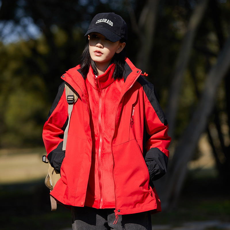 Women two-layer water-repellent outdoor jacket with hood, waist adjustment and contrast piping