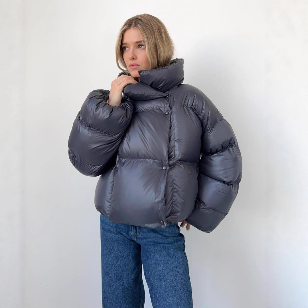 Women extravagant oversized quilted down jacket with extra voluminous hood
