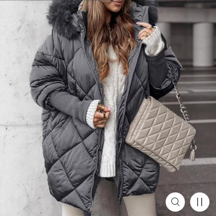 Women longer quilted winter parka with large hood and faux fur trim