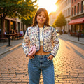 Women's short-cut quilted blouson jacket with floral embroidery and contrasting piping
