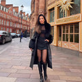 Women's long faux leather coat with wide faux fur collar and cuffs
