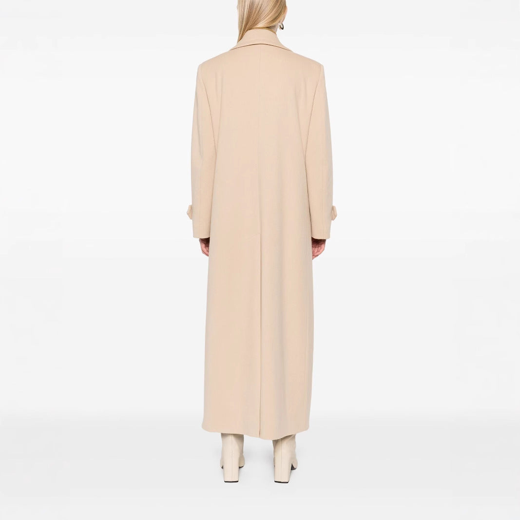 Ladies Maxi Coat with double-breasted button placket, wide lapels and patch pockets