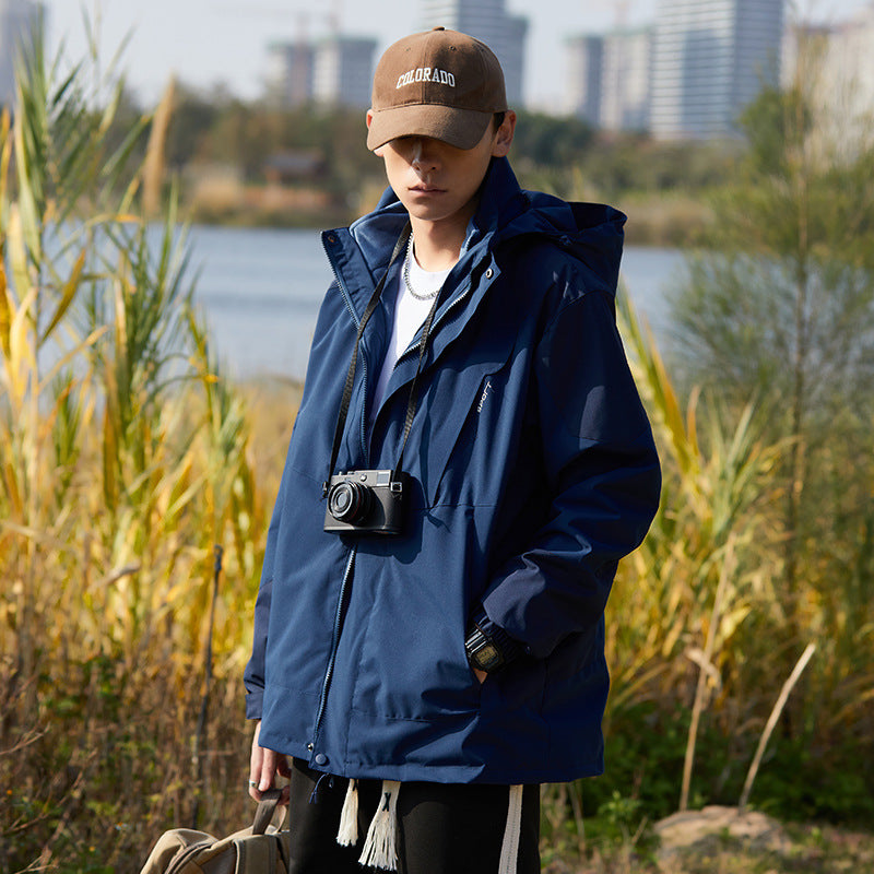 Women two-layer water-repellent outdoor jacket with hood, waist adjustment and contrast piping