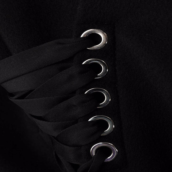 Women’s long coat in minimalist double-breasted style with tailored silhouette and flap pockets