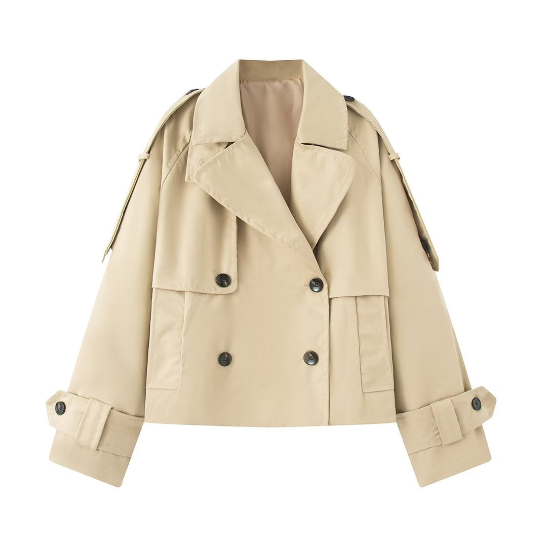 Ladies short cut double-breasted trench coat with wide shawl collar, tailored belt and adjustable sleeve straps