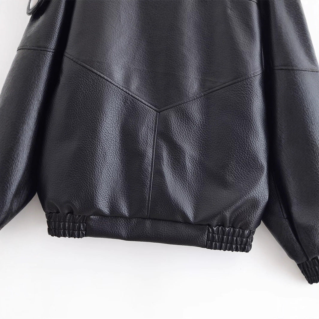 Ladies leather jacket with high stand-up collar and asymmetrical snap button placket