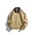 Men's short-cut blouson jacket with faux leather collar, snap placket button, and elastic cuffs