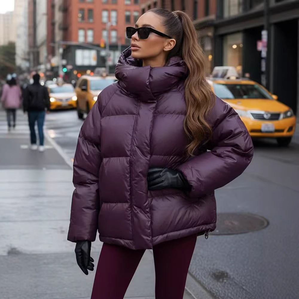 Ladies short padded oversized quilted jacket with high standing collar and hood