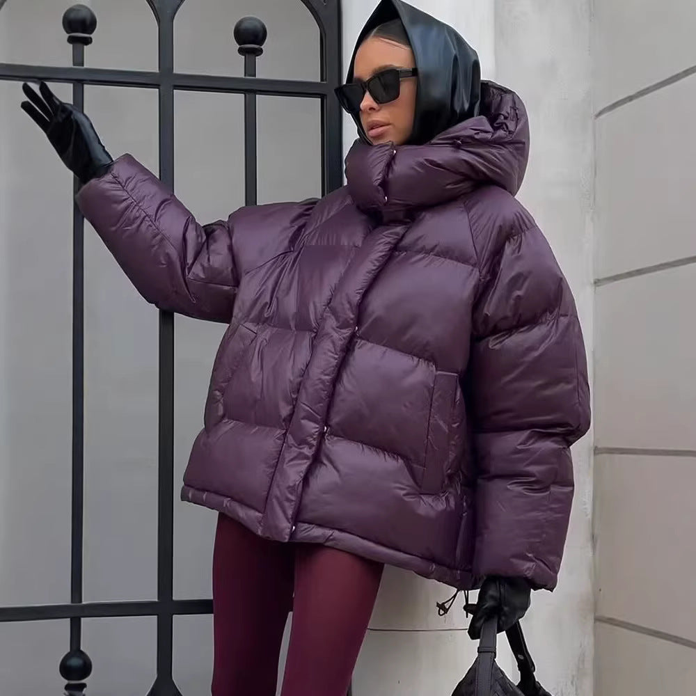 Ladies short padded oversized quilted jacket with high standing collar and hood